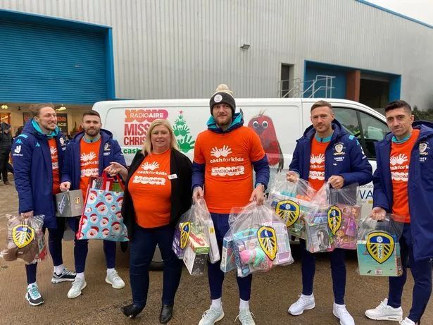 LUFC players with Lisa from Cash for Kids