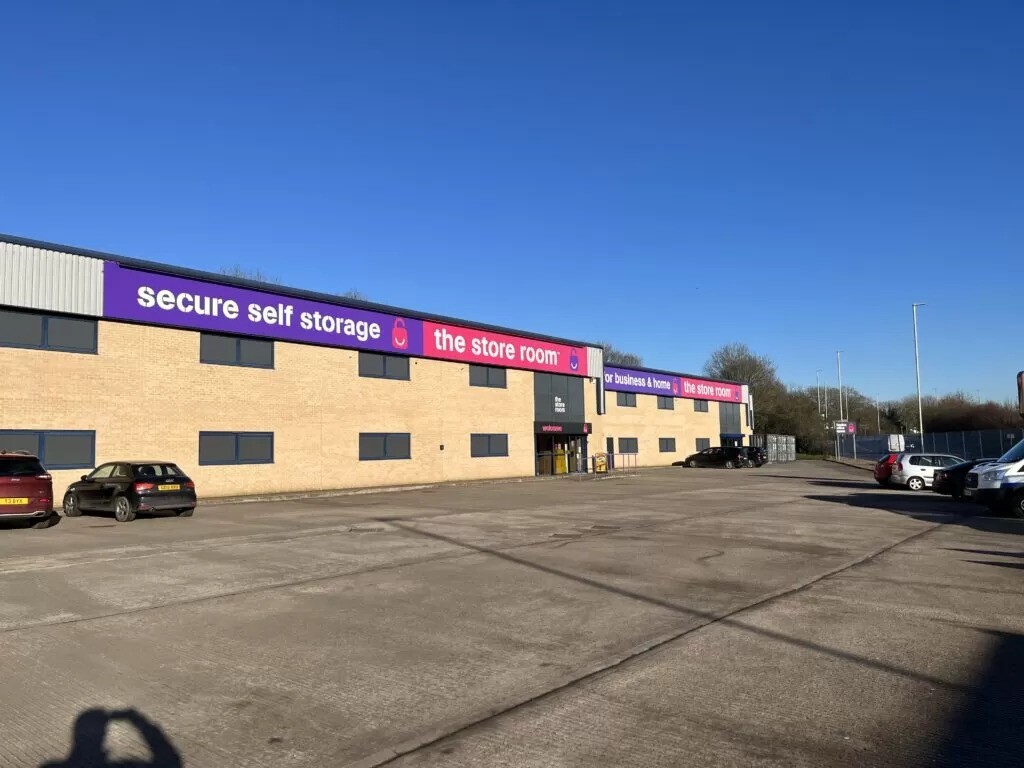 The Store Room purple and magenta signage