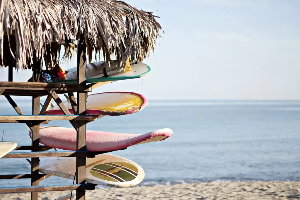 Image of 4 surfboards stacked up